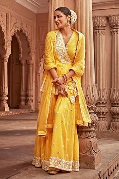 Shop for PREEVIN Yellow Floral Pattern Peplum Angrakha Sharara Set for Women Online at Aza Fashions Tulle Pants, Sheer Dupatta, Haldi Outfits, Mirror Embroidery, Embroidered Hem, Embroidered Crop Tops, Draped Skirt, Sharara Set, Pattern Embroidery