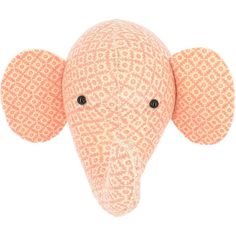 an orange and white elephant head with black eyes