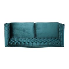 a blue couch with buttons on the back and armrests, against a white background