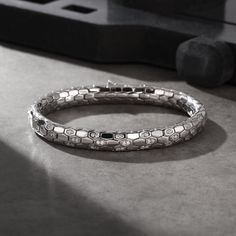 ⭐ 40% OFF until end of May! Grab this deal now! ⭐ Elegant Python Bracelet - A Testament to Masculine Elegance, Handcrafted Silver Bracelet, A Perfect Addition to Men's Accessories, Silver Bracelets, Exquisite Silver Jewelry for Men, An Ideal Gift for Him. This 925k Sterling Silver Python Bracelet adorned with Cubic Zirconia Diamonds in a unique snake design is a symbol of strength and elegance. Like all our jewelry pieces, this bracelet is a labor of love, crafted with utmost care, using high-qu Silver Jewelry For Men, Mens Bracelet Silver, Silver Collection, Accessories Silver, Stylish Bracelet, Snake Design, Jewelry For Men, Unisex Bracelets, Sterling Silver Mens