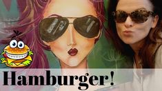 a woman wearing sunglasses next to a painting of a hamburger with a smiling face on it