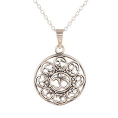 Carrying a promise of eternal peace this Pendant necklace from India is designed by Shivani Choudhary. She works with local artisans who craft the pendant from sterling silver to feature intricate openwork om symbols promoting thought and meditation. Symbolic Jewelry For Festivals, Spiritual Medallion Necklace With Filigree, Spiritual Medallion Necklace With Filigree Details, Spiritual Sterling Silver Medallion Necklace, Spiritual Oxidized Round Pendant Necklace, Spiritual Filigree Medallion Necklace, Spiritual Medallion Filigree Necklace, Sterling Silver Spiritual Necklace With Intricate Design, Spiritual Sterling Silver Necklace With Intricate Design