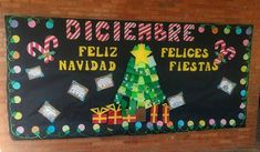 a bulletin board is decorated with christmas trees and presents for the students to put on