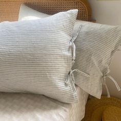 two pillows are on top of each other