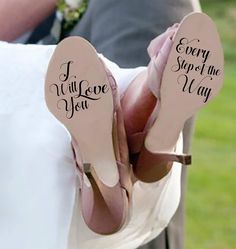 the bride and groom are holding up their wedding flip flops that read, sorry spot me i will love you