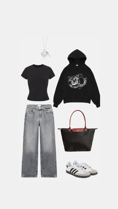 a black top, jeans and handbag are arranged on a white surface with an image of a woman's face in the background