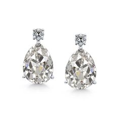 METAL SPECIFICATIONS White Gold 14K STONE SPECIFICATIONS Stone Name : Old Miner Stone Cut : Pear and Round Stone Details : There is one pear old miner diamond approx. 2 carats (Approx. Size 8.5 x 7 mm) and approx. 0.25 carats of smaller diamonds in each earring. Natural earth mined diamonds. Approx. Age of Diamonds : Over a Billion years old Place of Formation : At depths between 93 to 155 miles in the Earth mantle Color : F/G Clarity : VS1 Total : Approx. 4.50 Carats EARRING SPECIFICATIONS Over Classic White Teardrop Earrings With Diamond Accents, Classic Teardrop Earrings In Brilliant Cut, Classic Diamond Drop Bridal Earrings, Classic Teardrop Diamond Earrings For Formal Occasions, Classic Drop Diamond Earrings, Classic Pear-shaped Teardrop Earrings In Brilliant Cut, Formal Bridal Earrings With Prong Setting, Pear-shaped, Classic Pear-shaped Teardrop Earrings With Brilliant Cut, Formal Bridal Pear-shaped Earrings With Prong Setting