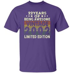 a purple t - shirt with the words, 22 years of being awesome vintage 2009