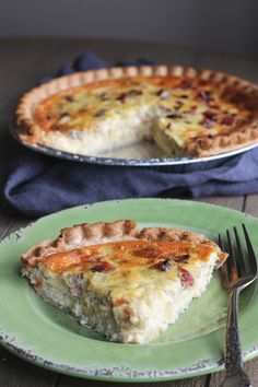 two pies sitting on top of green plates next to each other