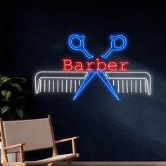 a barber shop neon sign with scissors and combs on the wall next to a chair