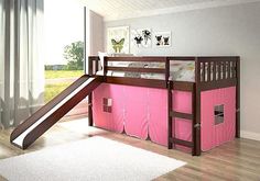 a pink bunk bed with a slide in the middle and a rug on the floor