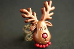 Rudolph Ring. Christmas Ring. Red Nosed Reindeer Ring. Holiday Ring. Deer Ring. Bronze Ring. Adjustable Ring. Handmade Jewelry. by StumblingOnSainthood from Stumbling On Sainthood. Find it now at http://ift.tt/2hmjGgM! Deer Ring, Deer Rings, Christmas Ring, Christmas Buttons, Feminine Jewelry, Valentines Sale, Easter Sale, Bronze Ring, Red Nose