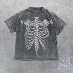 ABOUT THIS PRODUCT - Originally  designed by Oldschoolcult - Runs true to size (Relaxed fit) - For oversized fit go one sizes up your normal size - Comfortable unisex fit - 100% cotton - Professional high quality print TYPES - Available in given colors and sizes - See pictures for example ORDER & SHIPPING - It will take 1-4 business days to print and ship. Estimated shipping times are given but in almost all cases, the items are delivered before the latest date. AFTERCARE - Wash inside out at 30 Rib Cage Shirt, Retro Skeleton, Gothic Tees, Y2k Skull, Grunge Shirt, Oversize Tee, Skull Tee, Skull Shirt, Shirt Y2k