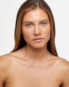 This necklace showcases soft pink hues, blending rose quartz and sparkling pink topaz for a gentle yet sophisticated look. Its delicate drop-style gemstones create a timeless and romantic aesthetic. 14 karat yellow gold Rose Quartz 16 to 17 inches length 3mm bead size Style # JJ-NAZ-418 UPC 810109742288 Gem Gem, Candy Necklace, Romantic Aesthetic, Candy Necklaces, Rainbow Sapphires, Quartz Pink, Rose Gold Quartz, Pink Topaz, Citrine Crystal