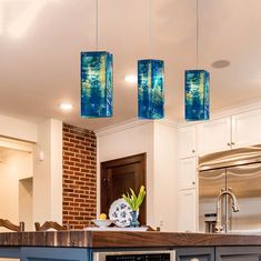 a kitchen with blue cabinets and an oven