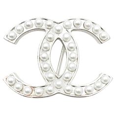 Chanel Classic Silver CC Pearl Brooch *Marked 05 *Made in France *Comes with the original box -Approximately 1.6″ x 1″ -Very pretty and classic -In a very good condition 2075-43572 Crystal Wedding Necklace, Chanel Pearls, Pearl Brooch, Crystal Wedding, Silver Pearls, Wedding Necklace, Chanel Classic, Costume Jewelry, Made In France