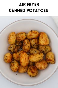 air fryer canned potatoes in a white bowl with the title overlay above it