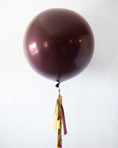 Lasts 3 to 5 days. See Longevity Notes. Inflated with air - this item will not float. This item is Ready-To-Party™ Handcrafted piece. May vary from picture. Features Make a bold birthday statement for a fun Harry Potter themed kids birthday! Use this giant balloon with tassel garland and number pedestal to dress up any space! This design includes a gold mylar number and Hogwarts Shield mylar balloon for extra fun. This set is Ready-To-Party™. Comes inflated and assembled. Simply unbag and enjoy. Details NUMBER PEDESTAL Color Palette:Balloon - Mahogany, Brass Gold, Lemon Spritz, BlackFoil - Gold number, Hogwarts Shield Dimensions:H (per foil) - approx. 3ftW (per foil) - approx. 1.5ftW (total) - approx. 3ft Material:Balloon - biodegradable latex and foil GIANT BALLOONColor Palette:Balloon - Giant Balloon, Balloon Tassel, Sweets Table, Party Place, Balloon Pop, Giant Balloons, Tassel Garland, Mylar Balloons, Balloon Garland