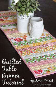 a table runner with a potted plant on it