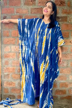 All dresses are custommade- ONLY FOR YOU! ..Hand tie dyed Kaftan, Cotton Caftan, Long Robe, Summer Dress, Long Maxi, Loungewear, beachwear, Maternity Dress, Holiday, Vacation Wear RARE, GENUINE AND UNIQUE PIECE FOR SURE!! The beauty of this kaftan is - -This lovely tie-dyed Indian kaftan is perfect for the poolside, beach or cruise holiday , anniversary gifts or as lounge wear. -It is indigo -Indian hand tie-dyed with intricate Indian motifs in dark Peachish golden yellow and white . Measurement Birthing Gown, Plus Size Gown, Blue Kaftan, Hospital Gowns, Delivery Gown, Cotton Caftan, Indigo Tie Dye, Kaftan Maxi Dress, Plus Size Gowns