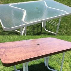 two rectangular tables sitting in the grass with one table upside down on it's side