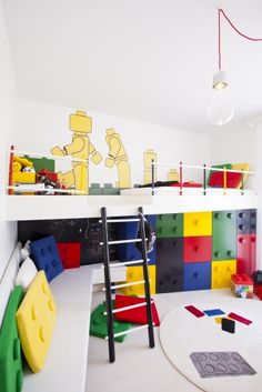 a child's room with legos and toys on the floor, including a bunk bed