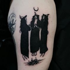 three witches standing in front of the moon tattoo on someone's leg with black ink