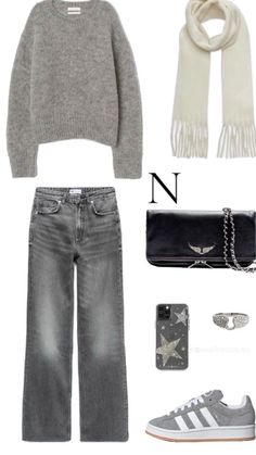 a gray sweater and jeans outfit with accessories