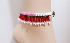 Handmade Boho Womens Girls Seed Bead Woven Geo Colorblock Adjustable Size Boho Fringed Anklet Native Tribal Red Jewelry Excellent Gift Beautiful handmade special fringed stitch....very complicated and GORGEOUS! Seed beads in red pinks white silver. Fringed anklet is adjustable with handmade bead ball and 3 loops 9 to 10 inches. Super high quality. Treasured gift comes in box. Easy to wear casual chic vintage for the disco sporting life. **Please note the color differences, color/contrast vary wi Red Fringe Summer Jewelry, Red Handwoven Beads For Festival, Red Bohemian Beaded Fringe Jewelry, Traditional Red Beaded Fringe Jewelry, Traditional Red Fringe Jewelry, Bead Ball, Flamingo Earrings, Treasure Gift, Anklets Boho