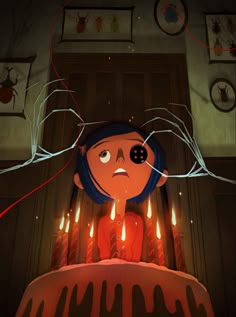 a cartoon character sitting on top of a cake with candles in front of her face