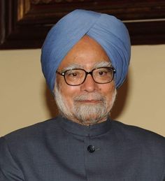 an old man wearing glasses and a turban