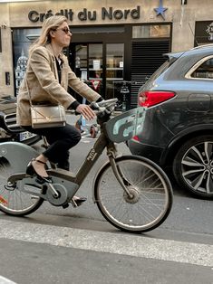 Everyday Parisian Street Style With 25 Outfits | La Vie On Grand Real Parisian Street Style, Trench Coat Style Parisian Chic, French Trench Coat Parisian Style, Black Jeans Parisian Style, Biking In Paris