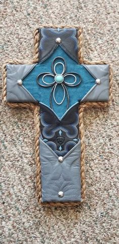 This beautiful cross is made from worn cowboy boots, rope, and silver accents.  It will warm any room. Cowboy Boot Crafts, Western Cross, Old Boots, Beautiful Cross, Cow Boy, Cowboy Boot, Silver Accents, Wall Hangings, Cowboy Boots