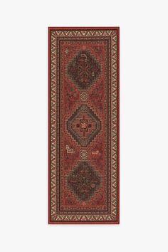 a red rug with an ornate design on the bottom and sides, in two different colors