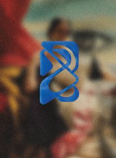 a blurry image of a woman's face behind a blue logo