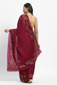 Wine saree embroidered with floral gold zari and sequins. Comes with matching running blouse piece. - Aza Fashions Traditional Georgette Pre-draped Saree For Celebration, Pre-draped Georgette Saree For Celebration, Festive Pre-draped Saree With Dupatta In Georgette, Festive Pre-draped Georgette Saree With Dupatta, Pre-draped Saree With Sheer Dupatta For Celebration, Elegant Pre-draped Chinon Saree For Celebration, Festive Georgette Pre-draped Saree With Pallu, Festive Georgette Embroidered Saree Fabric, Celebration Georgette Fabric With Zari Work