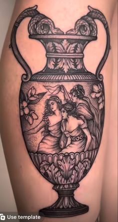 a woman's thigh with a vase tattoo on it