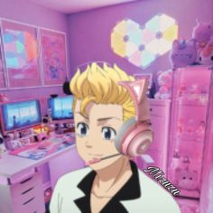 a young man with blonde hair in a pink room