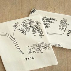 two tea towels with the words rice printed on them