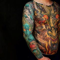 a man with many tattoos on his body