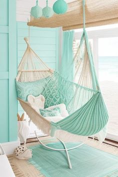 Beachy boho bedroom with seafoam green accents, seashell decor, and hammock chair. Girls Ocean Bedroom, Seashell Decorations, Ocean Bedroom, Ocean Room Decor, Beachy Room Decor, Ocean Themed Bedroom, Beach Room Decor, Ocean Room, Beach Themed Bedroom