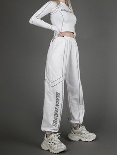 Features: It features loose sweatpants, high waist with elastic band, right hem with black zeous print decoration, reflective design.  Fabric: Polyester  Attention: This price includes a pair of sweatpants only, others are not included.  Size Chart(cm):   	 		 			Size(cm) 			S 			M 			L 		 		 			Waist 			56 			58.5 			61 		 		 			Hip 			107 			109.5 			112 		 		 			Sweatpants Length 			98 			99 			100 		 	   (Inevitable measurement error 2-3 cm.) Futuristic Cyberpunk, Loose Sweatpants, Sweatpants Black, Dance Outfit, Design Fabric, Dance Outfits, Cotton Style, Elastic Band, Women's Pants