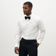 An essential for any black tie affair! Our 100% cotton Tuxedo shirt is designed with french cuffs and removable studs for an elegant, polished look. White Tux Black Shirt, White Tuxedo Shirt For Men, Tuxedo Style Bow Tie For Black-tie Events, Cummerbund Tuxedo, Black Tuxedo Shirt, Shawl Lapel Tuxedo, Black Suit Vest, Black Tuxedo Jacket, Tuxedo Shirt Men