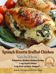 spinach ricotta stuffed chicken on a white plate