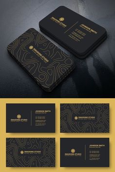 a black and gold business card on a dark surface with the words, company logo