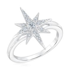 The Radiant Universe Collection seeks to capture the nature of celestial bodies and infuse that powerful energy into your every day style. Crafted in 10k white gold, this Radiant Universe Celestial Diamond North Star Ring boasts sparkling diamond accents along its starburst design. Diamonds are 1/4ctw, I in color, and I2 in clarity. This ring measures 20mm across the top and 2mm across the bottom. Celestial White Gold Diamond Ring, Celestial Silver Diamond Ring With Accents, Celestial Style Silver Diamond Ring With Accents, Celestial Style Silver Diamond Ring, Silver Star-shaped Celestial Diamond Ring, Celestial Silver Star-shaped Diamond Ring, Celestial Star-shaped Silver Diamond Ring, North Star Ring, Gothic Ring