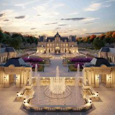 a large building with a fountain in front of it and trees around the courtyard area