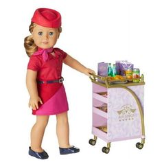 When dinnertime or snack time roll around, so does this fancy food cart that helps the flight attendant easily move everything down the aisle of the American Girl Air Lines plane. Size: 18" dolls.  Color: Multicolor.