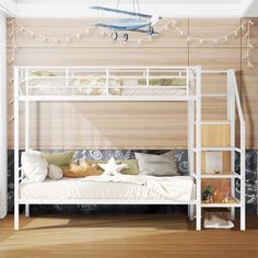 a white bunk bed sitting in a bedroom next to a wooden wall with lights on it