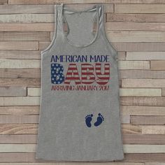 an american made usa tank top with footprints on it and the words, america made bau